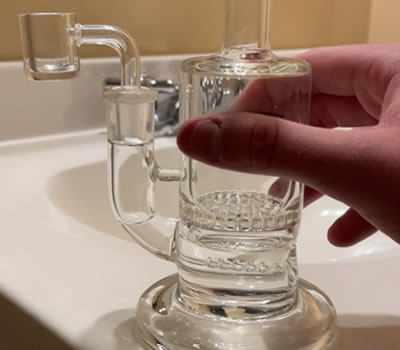 clean glass bong after using Rezz Rockz residue cleaner